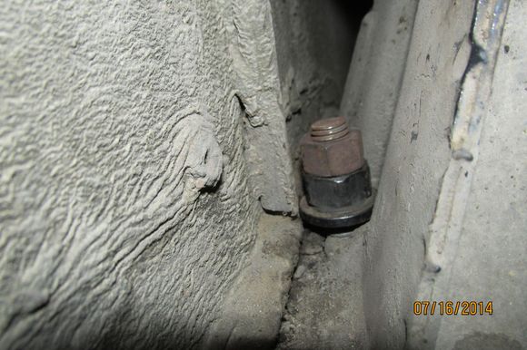 I have an oversized machined nut with integral washer on top with a normal nut as a jamb. To me, this is CRITICAL. If you're lowering the spring/perch, the top nut could also turn and allow the compression of the spring to rocket free and use your head as a backboard.