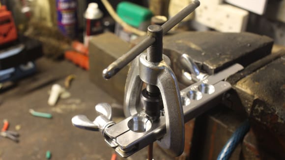 Forming the Male Flare with the Clamp, Die and Press.
