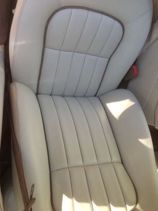 Looking down on the driver seat and the bolster. the heavy wear is gone.