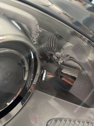 Showing melted portion of headlight. 