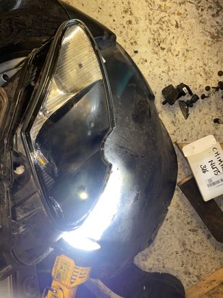 Torch illuminating drain holes. 