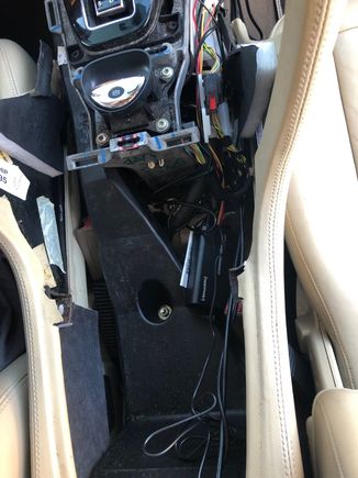 The receiver is small and fits nicely in a void behind the shifter.