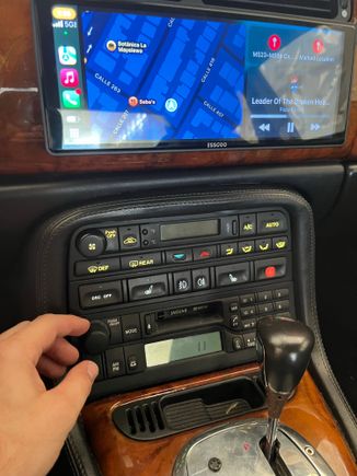 Carplay with music and map on display. 