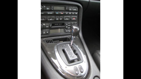 Carbon fiber - with a "R" at the gear knob