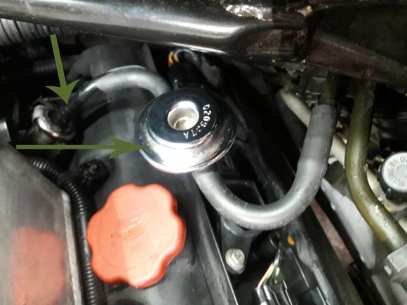 It is the s shaped pipe from manifold to return/or feed from petrol tank.  Arrow pointing down shows where crack is - measuring about 45mm long/  Desperate for part no or other help.
