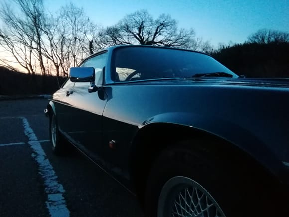My god, a tablet/smartphone camera really is terrible compared to a DSLR.... Anyway, I liked the way the dark blue of the gloaming matched the dark blue of the car, with the last red of the sunset reflecting along the body.