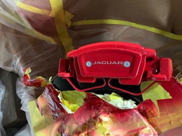 Painted and installed without disconnecting the caliper. You will need a metric tap for the cover screws (don't remember the size)