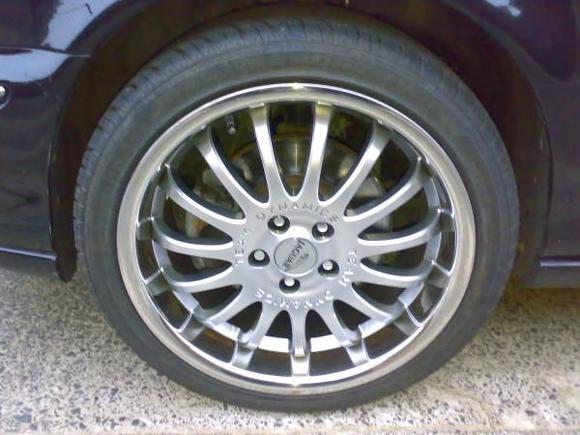 18" Team dynamics alloy wheels with deep dish polished metal rim.