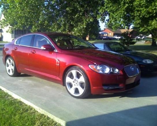 Snapping pics at friends house with our little Miata in the background.  LOL  (Jag before any chrome and leaper.)