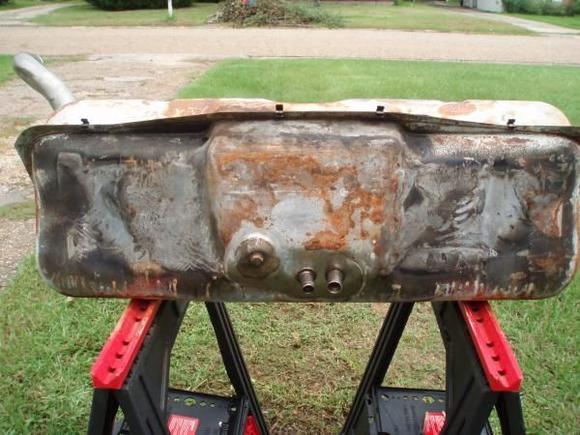 Tank out of vehicle, bottom-facing side.