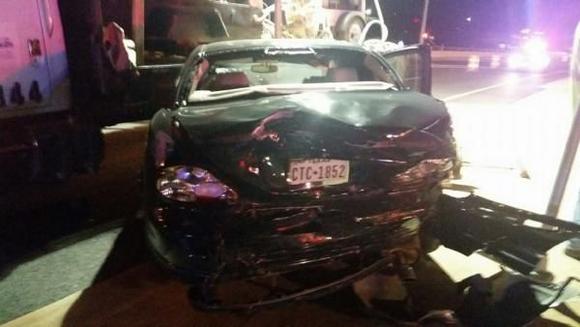 I was rear ended while sitting still at a red light. The driver was going about 80 mph. It pushed me 50 feet over median and I crashed into a construction truck.