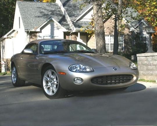 2002 Jag with new egg crate grill over mesh. Top is up because it is cold out and didn't wan ther to geet cold.