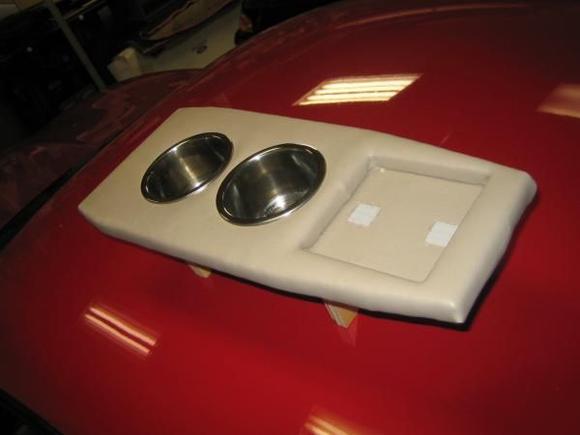 top view of new console insert.  The two cup holders I bought from an marine supply store. they are large stainless steel inserts.  The rear square is for a tissue box.  The wife's request.