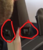 Both locking tabs shown