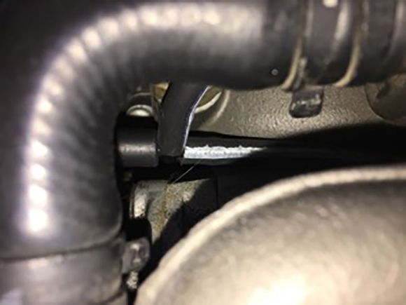 Vacuum hose attached to T-connector