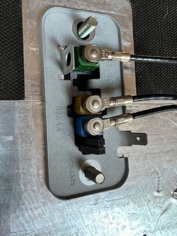 Once the panel is free, you will find data cables attached to the antenna that must be unplugged before you can remove the panel and access the antenna