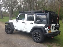Back side shot of 2016 Rubicon unlimited with Gobi stealth-rack and ladder.