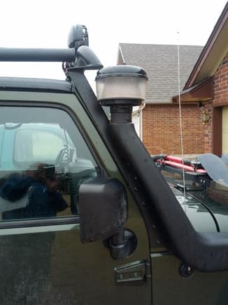 Finished install.  Note how the original AEV bracket lays atop of the new MBRP rack downrod.