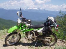 A view of the crags of the Valhalla Mts in BC and my KLX