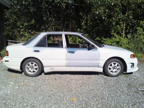 I managed to pick up a set of Nissan NX2000 Wheels with Tires for cheap! looks good on her! also done a fair amount of work to her kit and body! Shes almost ready for the road!