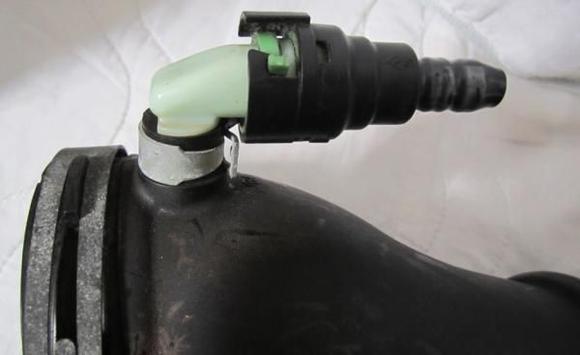 Accordian Intake Top Piece before throttle body, Top.
To remove that piece, flip the little green piece.