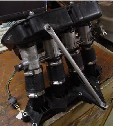 Custom bracing to hold up the weight of the air box and throttles.