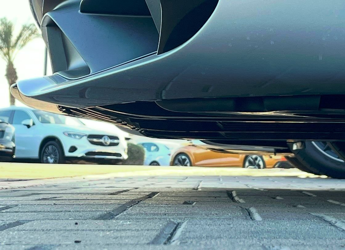 5� ground clearance about 24� ahead of tire foot print. About 6� clearance at leading edge of bumper.