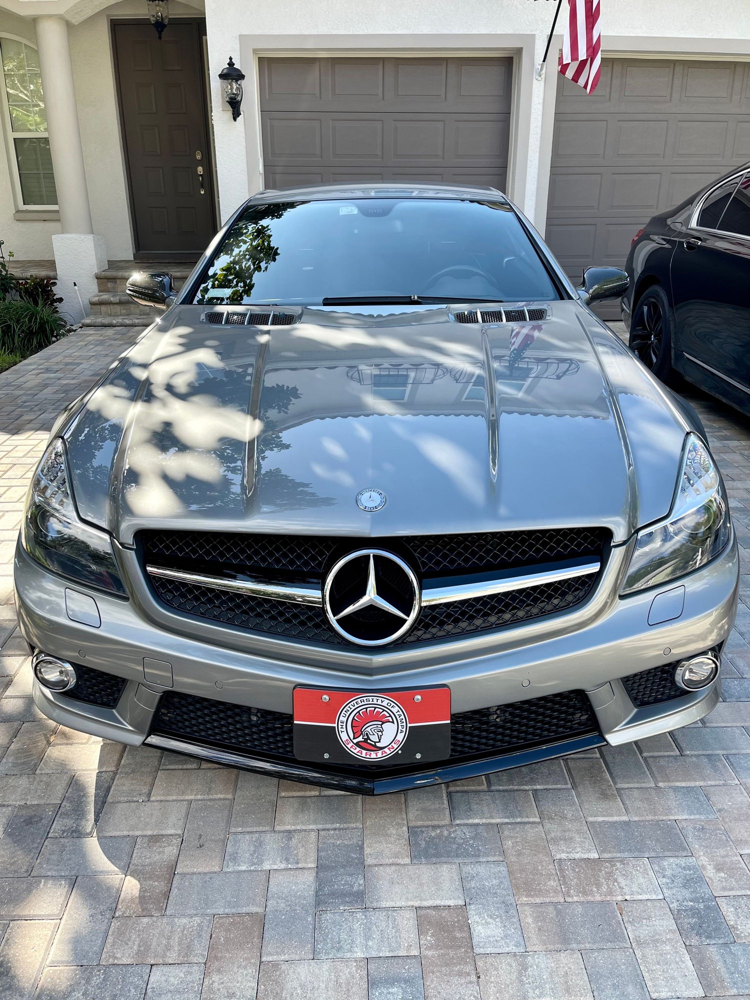 2009 Mercedes-Benz SL63 AMG - Impeccable condition 2009 SL63 AMG with low miles (P030 option car) - Used - VIN WDBSK70F59F145639 - 34,829 Miles - 8 cyl - 2WD - Automatic - Convertible - Silver - Tampa, FL 33611, United States