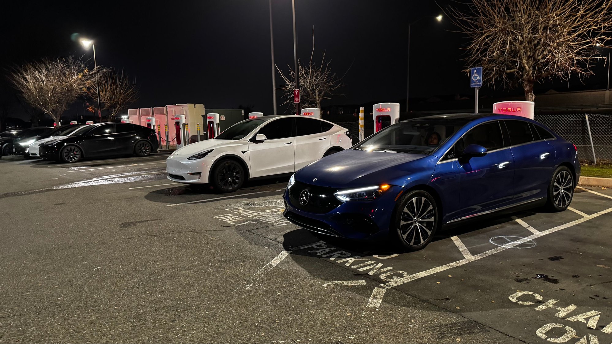 Supercharger V3 power sharing with one other Tesla.