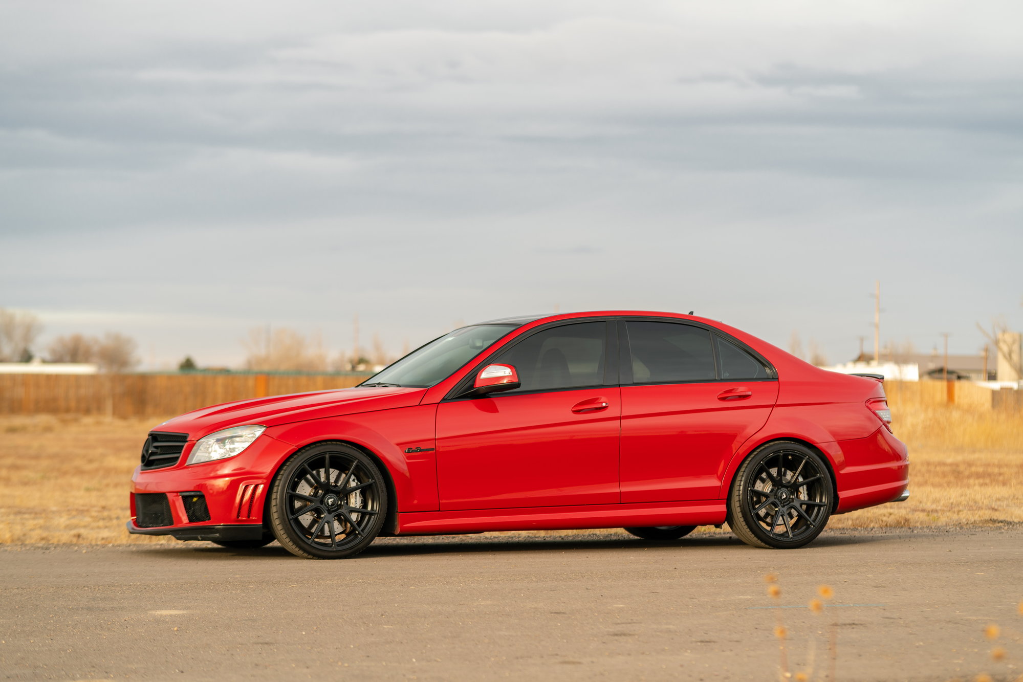 2009 Mercedes-Benz C63 AMG - Fire Opal Red 2009 Mercedes-Benz C63 AMG w/ P30 Package - Used - VIN WDDGF77X69F323106 - 88,700 Miles - 8 cyl - 2WD - Automatic - Sedan - Red - Frederick, CO 80530, United States