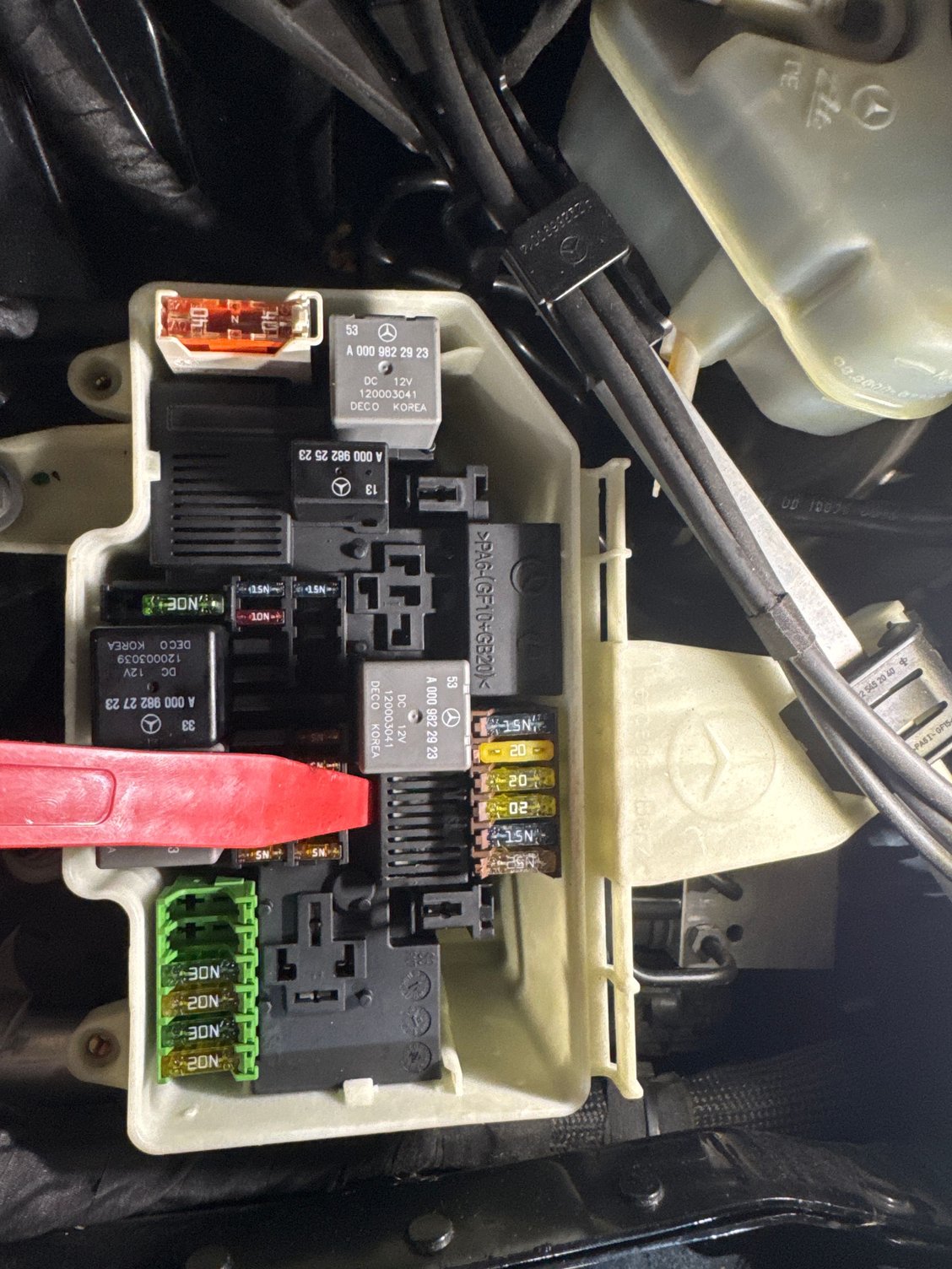 Fuse box relay under that plastic cover