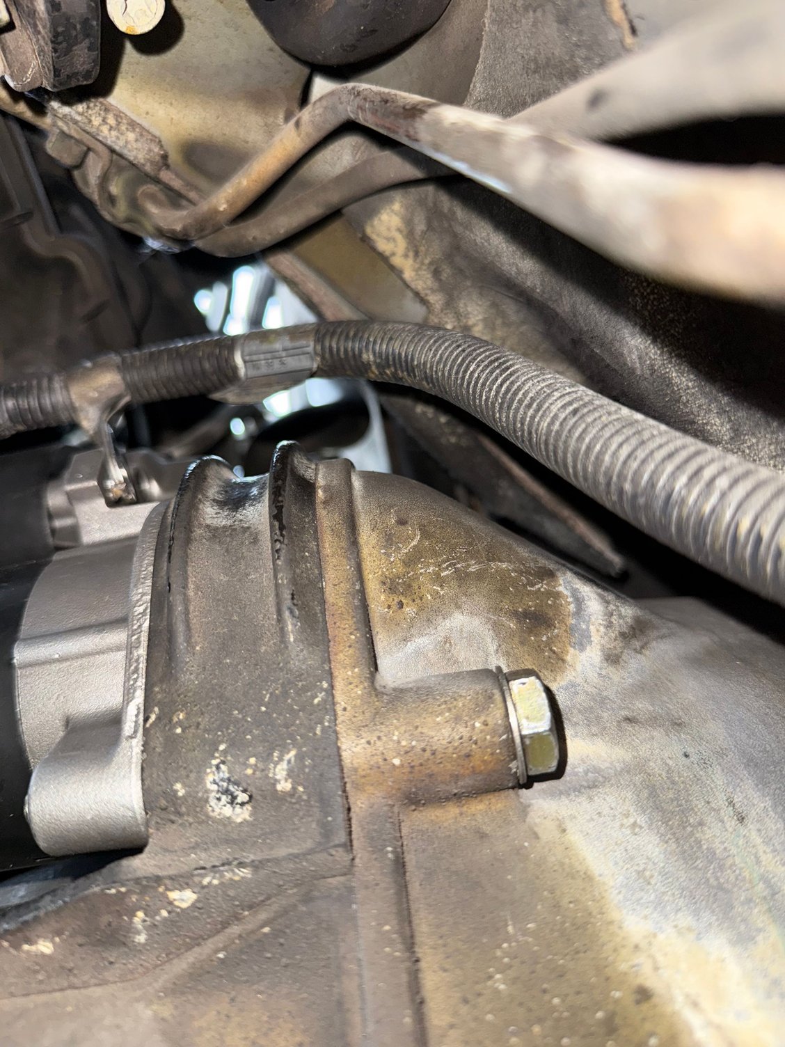 17mm bottom bolt there’s one on top too.