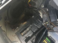 The cavity with the oem amp and cd changer removed 