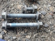 Here's the 4 bolts that come out. Note you'll need an 18mm wrench to hold the nut ontop of the steering linkage assembly to use the gun to secure them. Don't forget to use loctite.
