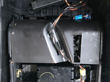The cup holder is in under there. 