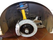 New front disc with painted center. Caliper paint is original - just needed cleaning.