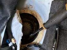 Tearing the cover off with pry bar and crow bar