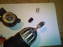 Dremel with a polishing bit and some metal polish will smooth out the bore of the solenoid body.