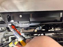 Here’s the second screw/C-clamp. My short screw driver was too long so I used a 1/4” socket and inserted the t25 bit into the 1/4” socket to unscrew this. Super easy but took some torque to loosen it. 