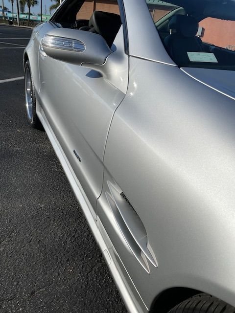 2004 Mercedes-Benz SL500 - A very nice maintained Sl500 - Used - VIN WDBSK 75FX4 F07 6 - 65,000 Miles - 8 cyl - 2WD - Automatic - Convertible - Silver - Melbourne, FL 32903, United States
