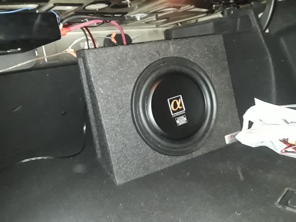 Slanted truck speaker box to fit into W203 trunk... alphasonik shallow mount 12 inch subwoofer.....works for me... okay!!!???... again....you do you... I'll do me.... I certainly appreciate any positive feedback... I played around with the amp, head unit and LOC adjustments using ear, DMM and Ocsilliscope and will continue to tweak the system... BTW... I did not heR hear any 