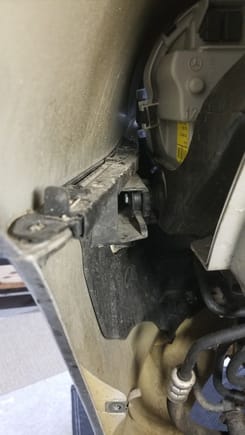 Clamp that holds lower front fender to bumper assembly.  Bolt holding it together is already removed.
