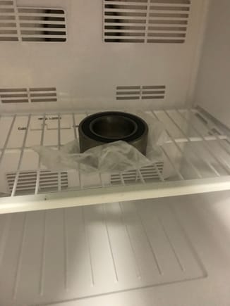 Placed the new bearing in the freezer to help contract it. 
