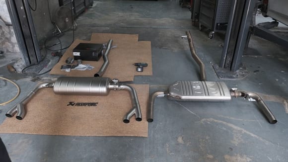 A comparison between Akrapovic and the stock exhaust, smaller muffler haha.