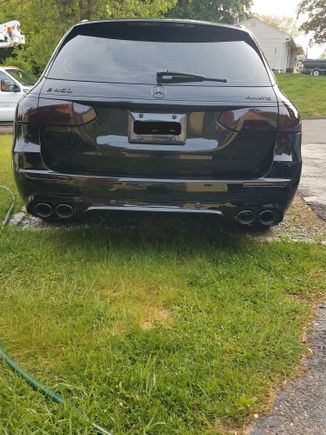 Changed out exhaust and rear spoiler and blacked out the car.