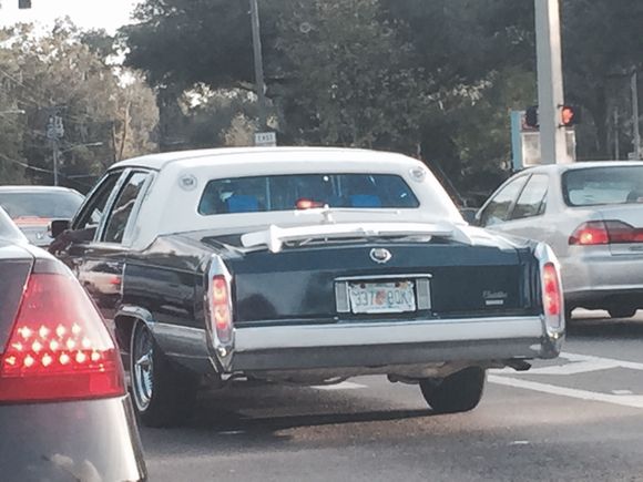 Couldn't get a shot of the front but he had two hood ornaments, one behind the other.