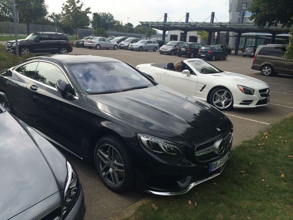 Parked next to a 2015 S Coupe at the factory