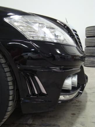 Black Bison Front Bumper close up side view with custom 2 tone paint and custom installed LED light