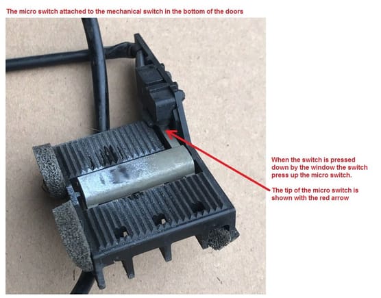 The window limit switch is just a mechanical switch that have a micro switch clipped on.
When the window press down the limit switch the limit switch press up on the micro switch 
