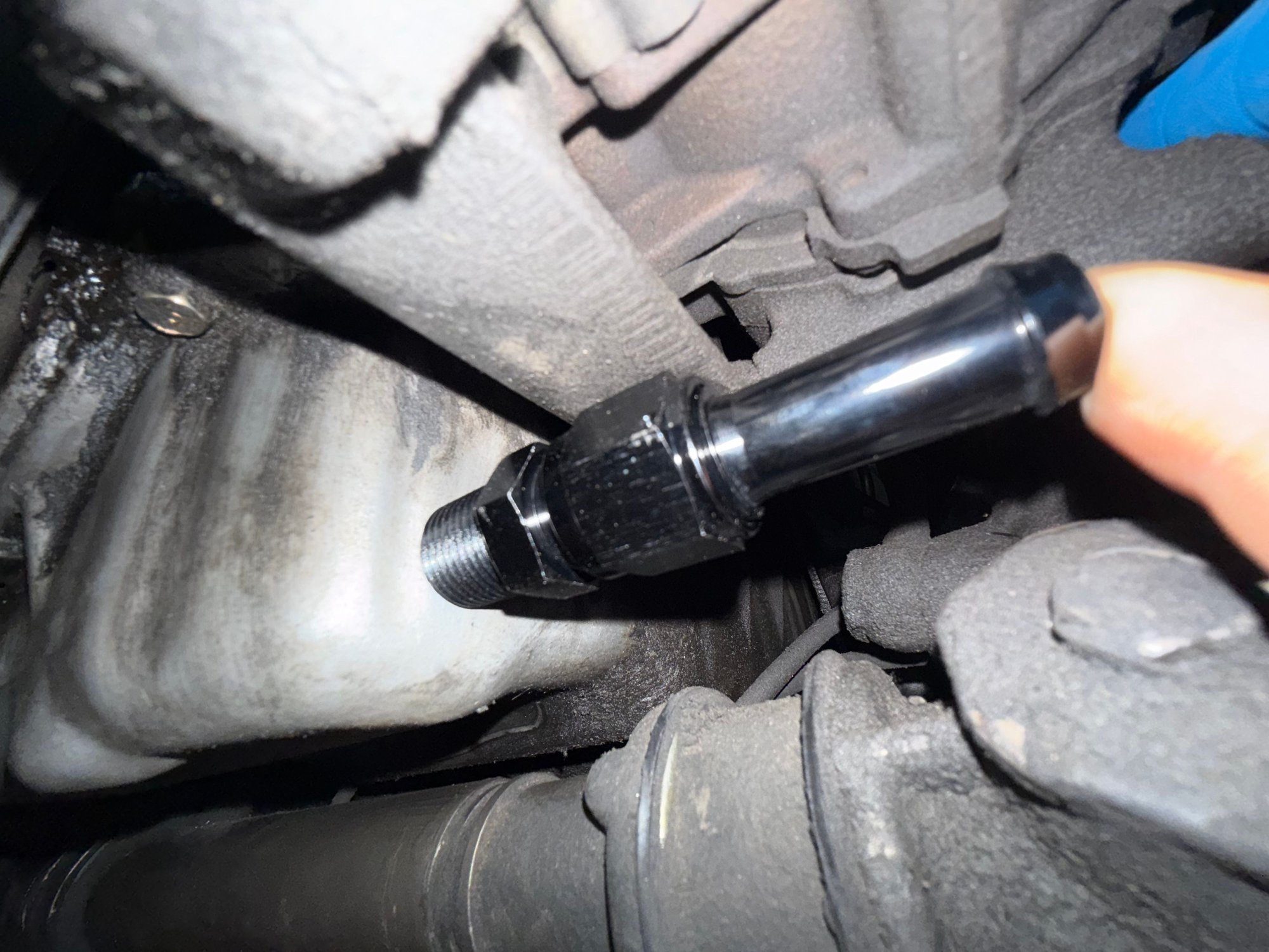 Roughly the area where NPT fitting will go into the oil pan. ~1.75” Barb to NPT. 